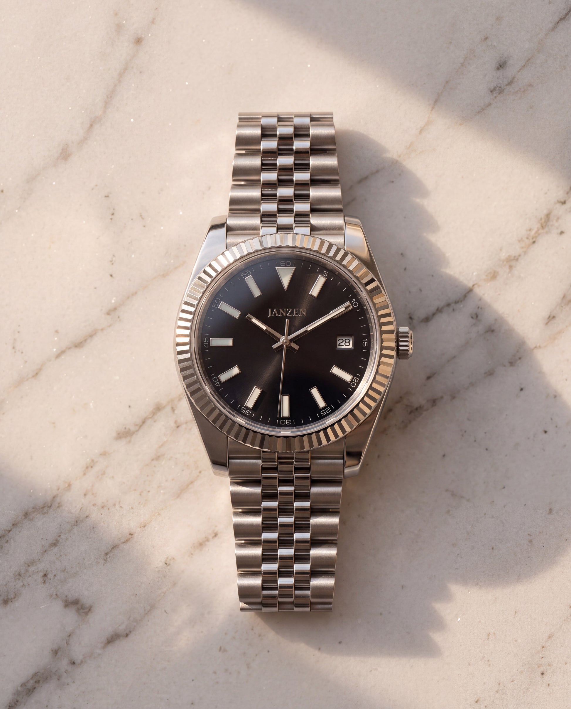 Datejust Jubilee- Avantgarde - 40mm — Flatlay auf Marmor