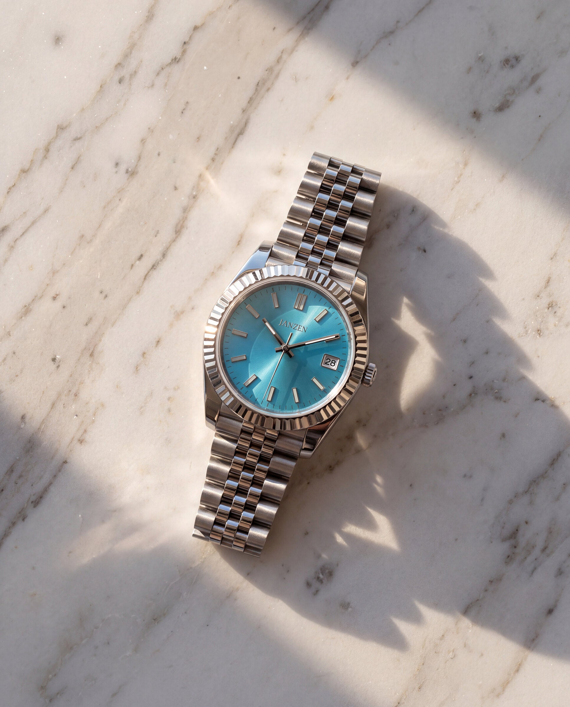 Datejust Jubilee - Sport - 40mm - Tiffany Blue — Flatlay auf Marmor (web)