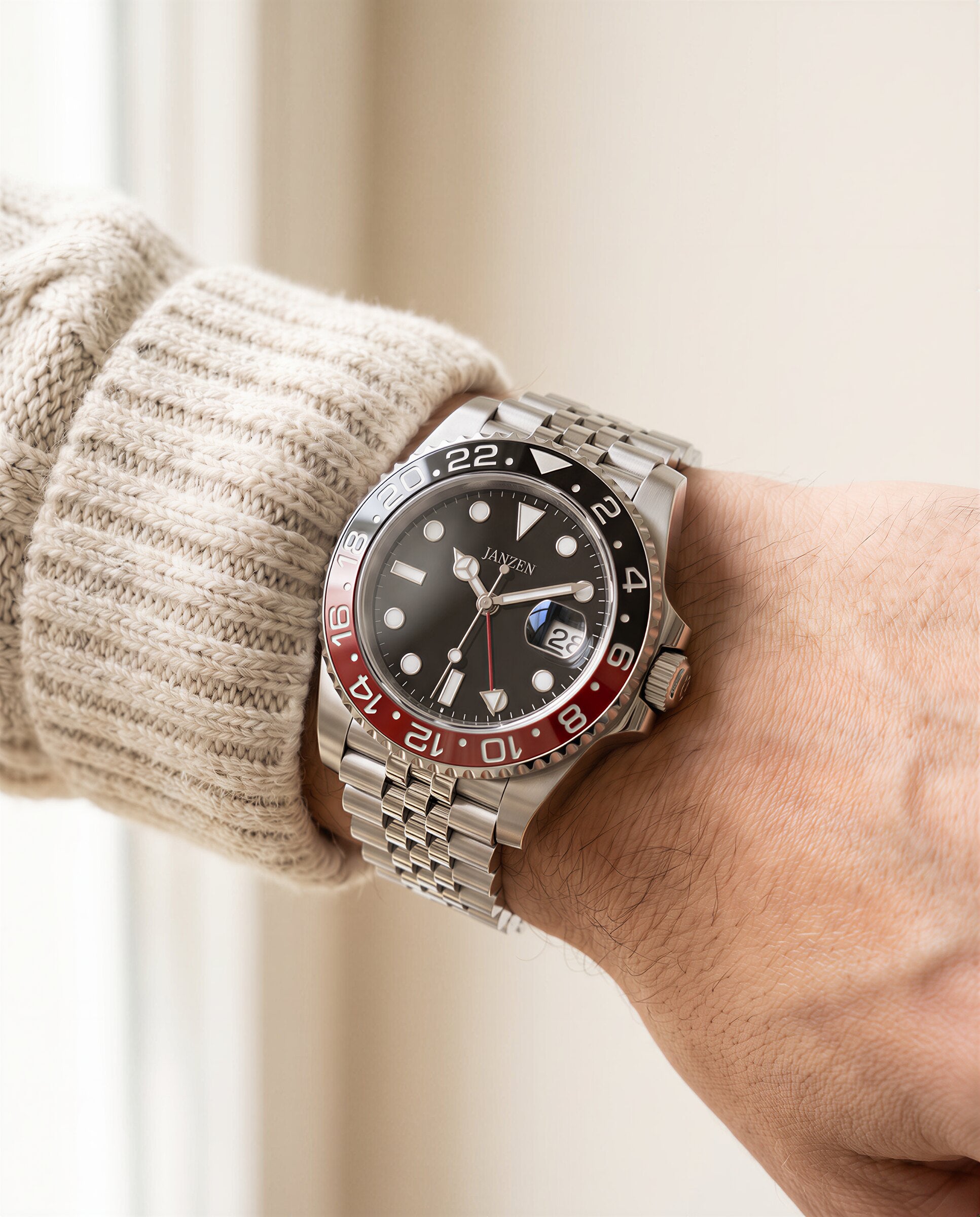 GMT-COLA — Wristshot Strick (web)